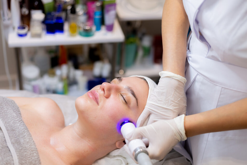 young beautiful girl lies beautician s table receives procedures